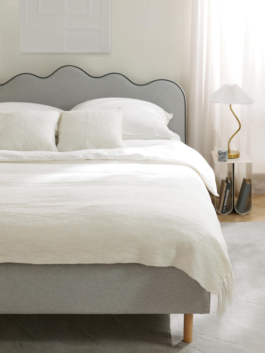 Romilla Upholstered Bed with Wavy Headboard