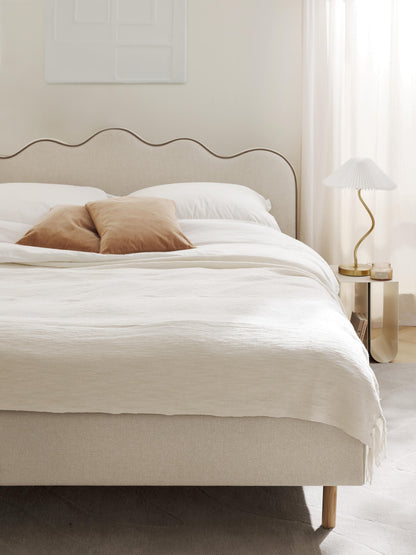 Romilla Upholstered Bed with Wavy Headboard